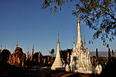 Inle Lake Myanmar. Indein, on the summit of a hill the  Shwe Inn Thein Paya a cluster of hundreds of ancient stupas. Many of them are ruined and overgrown with bushes. 